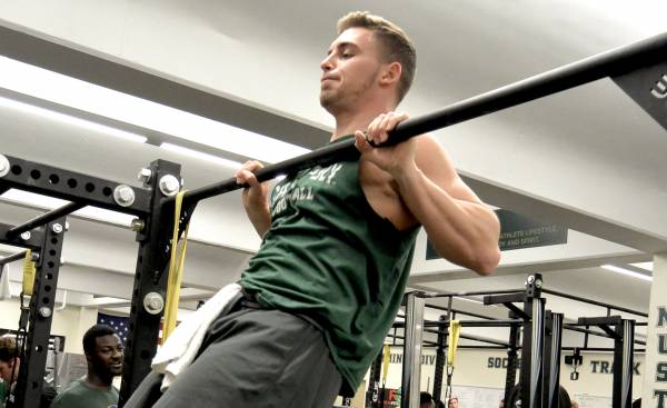 Pull ups are your key to upper back strength, but only when performed correctly.