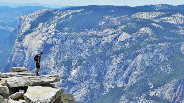 hiker looking over a canyon