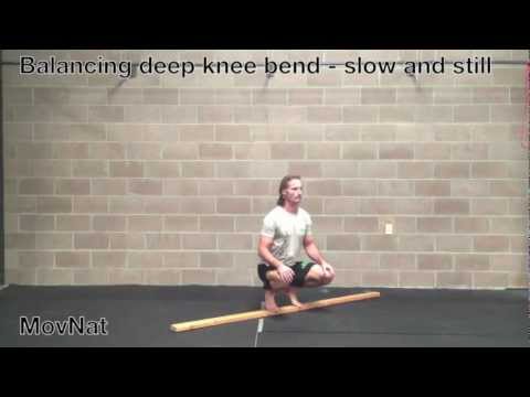 Balancing deep knee bend - slow and still