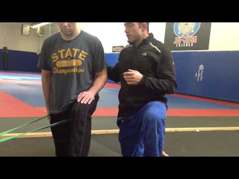 Video: BreakingMuscle.com: Hip Mobility - How to Do a Banded Hip Extension (Sam Spiegelman)