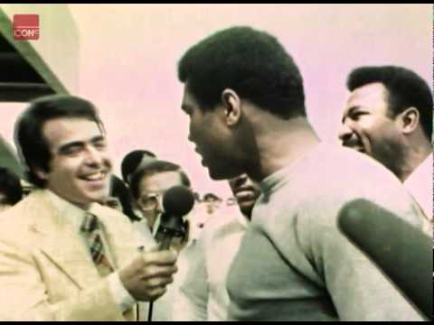 Muhammad Ali engaging in some of his famous trash talk
