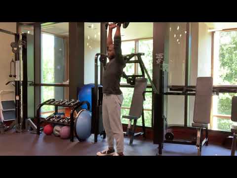 Standing Neutral Grip Overhead Dumbbell Press