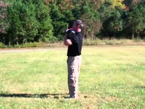 How To Double Kettlebell Military Press - Kettlebell Exercises: Double Kettlebell Military Press