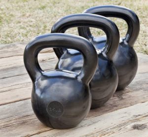 moving up in kettlebells, getting stronger with kettlbells, moving up kettlebell