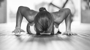 Strong woman doing a push up