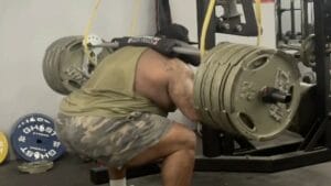 Julius Maddox completes a raw 775-pound squat.