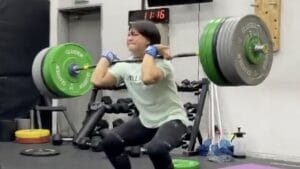Seungyeon Choi finishes off an impressive clean rep during a CrossFit Quarterfinals workout
