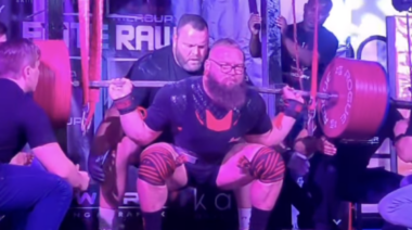 Powerlifter Nicolaas du Preez locks out a squat during the 2022 RPC Elite Raw