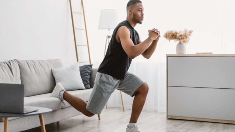 Home gym guy playing single leg squat