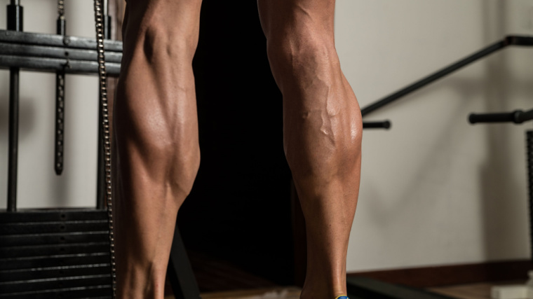 muscular calves doing raises