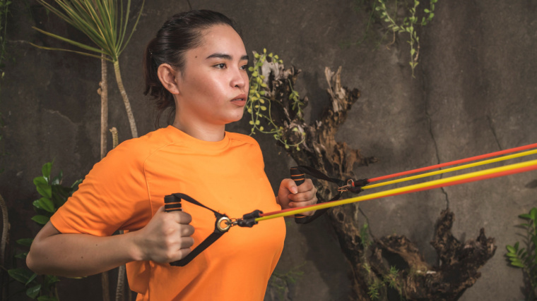 person doing cable back exercises