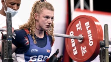 powerlifter Bobbie Butters holding barbell