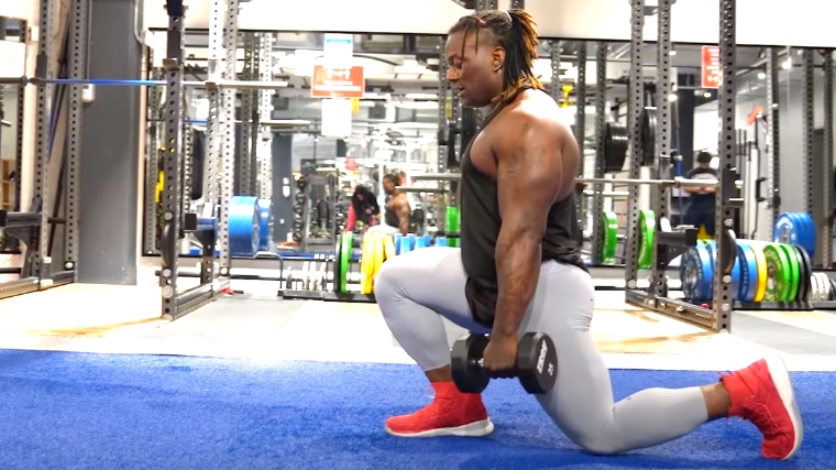 Dumbbell Split Squat: Video Exercise Guide & Tips