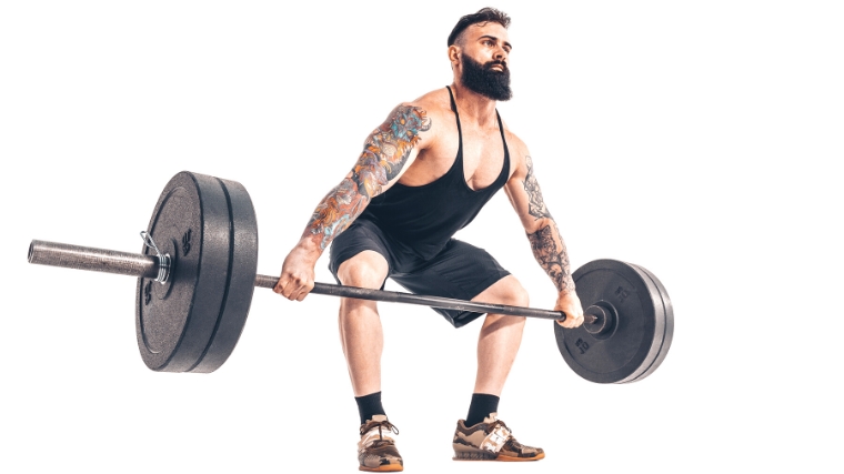 Weightlifter doing a barbell deadlift in good form.