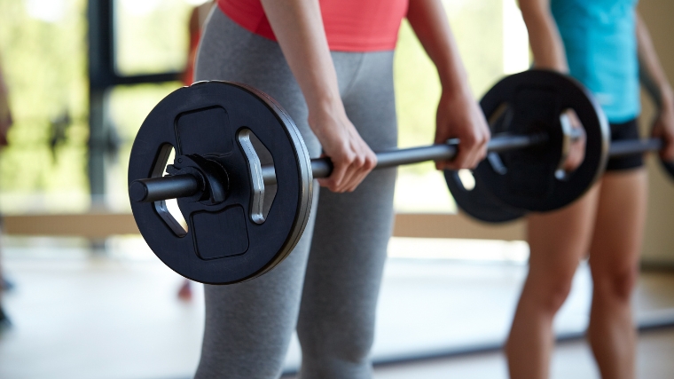 A person trying to do a clean and jerk.