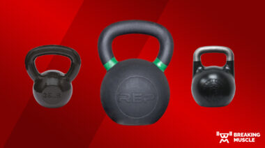Three kettlebells on a red background