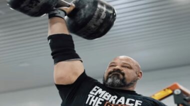 Brian Shaw Training With Overhead Circus Dumbbell