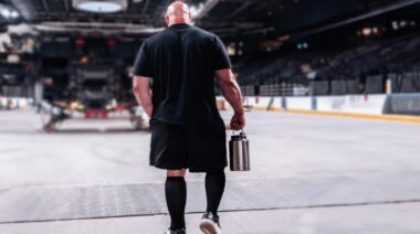 Strongman Brian Shaw walking in empty stadium