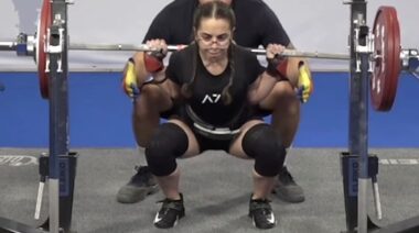 Powerlifter Elisa Misiano performing squat in competition