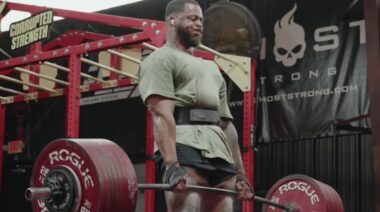 Powerlifter Jamal Browner locking out deadlift in gym