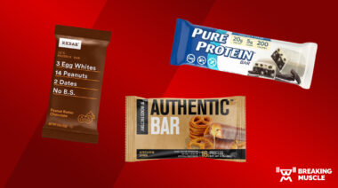 Pure Protein, Jacked Factory, and RXBAR protein bars on a red background