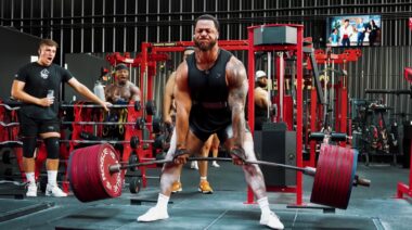 Powerlifter Jamal Browner in gym performing heavy deadlift