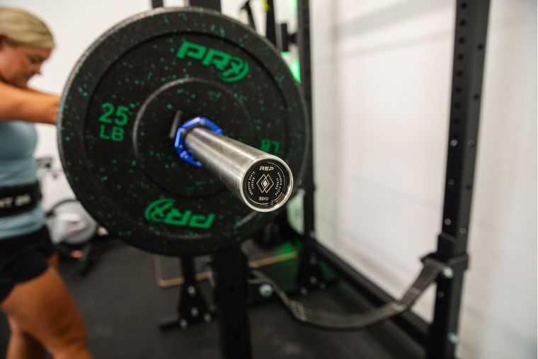 A close-up of the endcap on the REP Fitness Double Black Diamond barbell