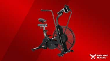 A photo of the Assault Fitness AssaultBike Pro X on a red background