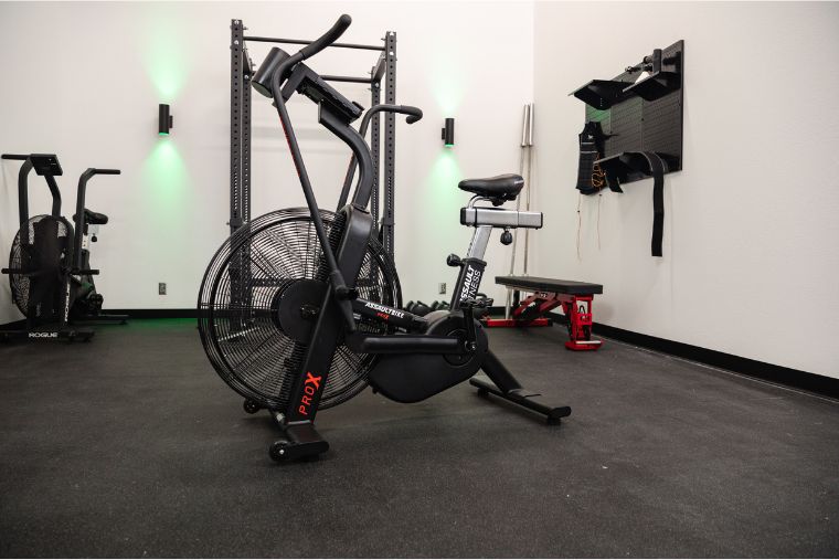 The Assault Fitness AssaultBike Pro X in a studio garage gym