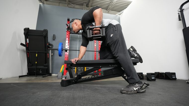 Man performs rows with the PowerBlock Pro 100 EXP Adjustable Dumbbells